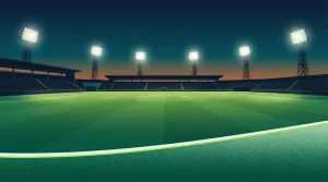 Fußballfeld unter vier Flutlichtmasten mit langen geometrischen Schatten